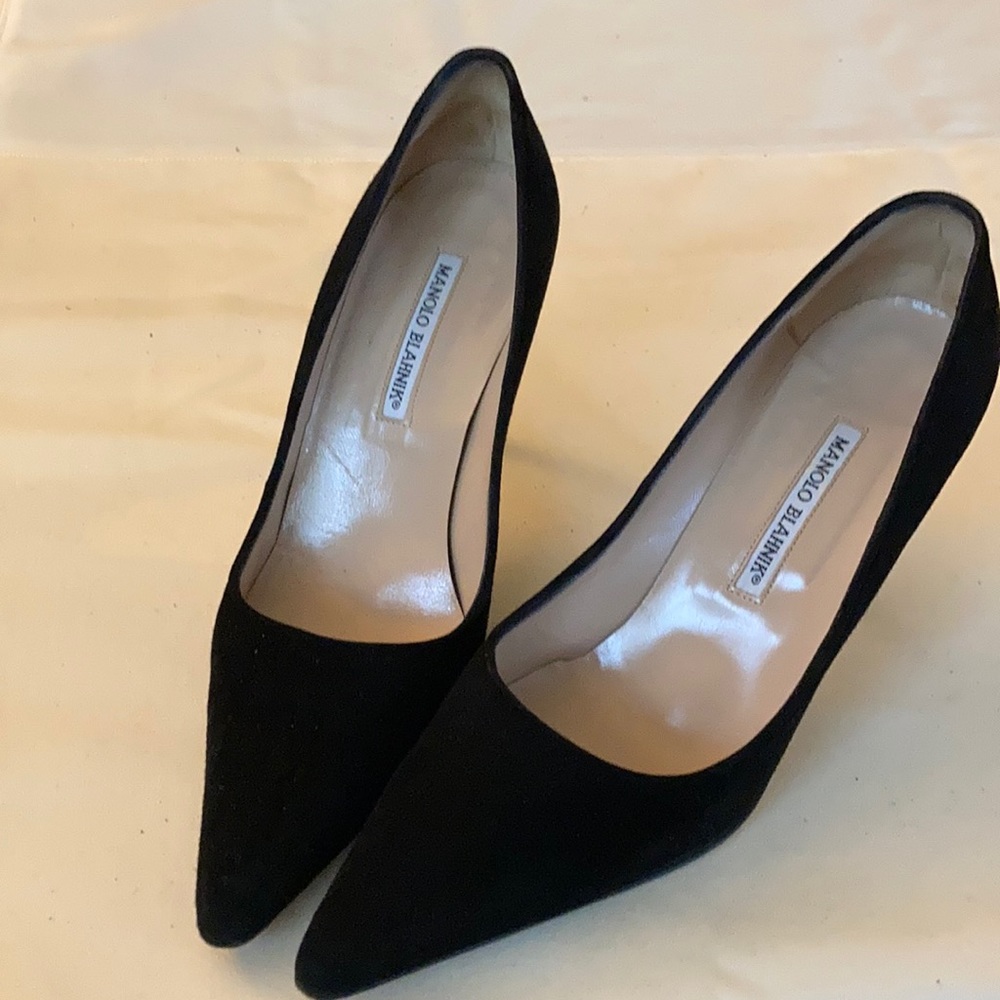 Classic Manolo Blahnik black suede high heel pump.